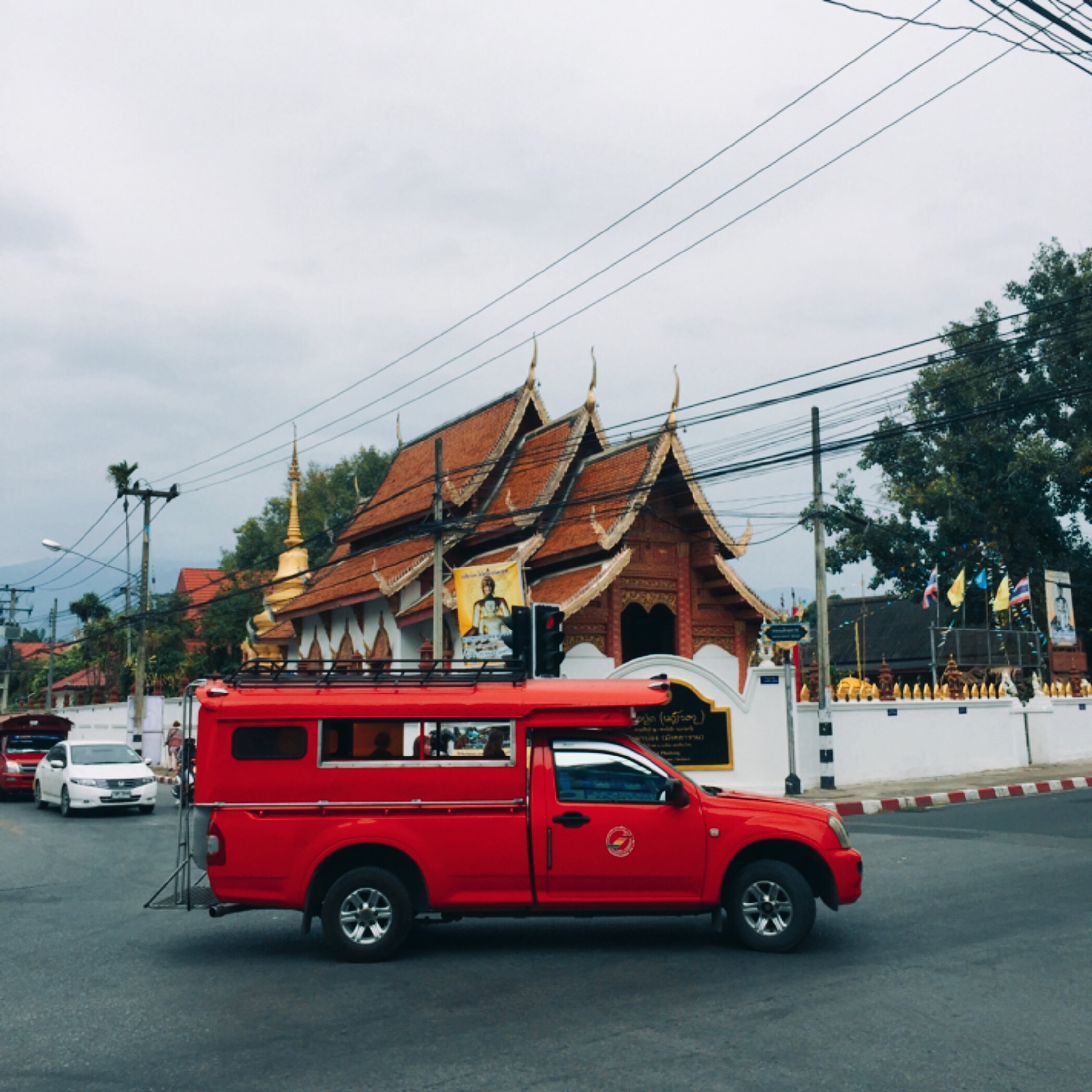 An iconic
songthaew in front of a Wat. Feb. 7,
2016