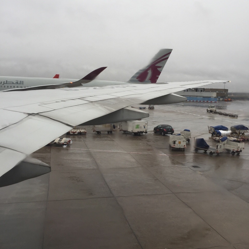 After boarding the Boeing 777-300er registered as B-2088 at Frankfurt
in a drizzle, the Airbus A350-900 of Qatar Airways was visible through
my
window.